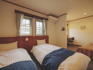 *部屋一例（トリプルルーム）／ツインベッドとエキストラベッドで最大3名様まで宿泊いただけます。